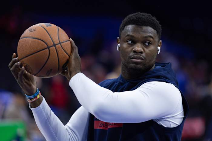 Zion Williamson holds the ball